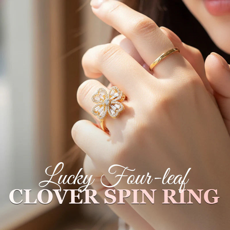 Spinning four-leaf clover ring