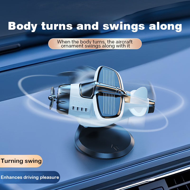Solar powered airplane shaped car ornaments