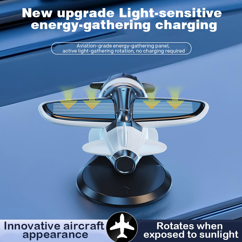 Solar powered airplane shaped car ornaments