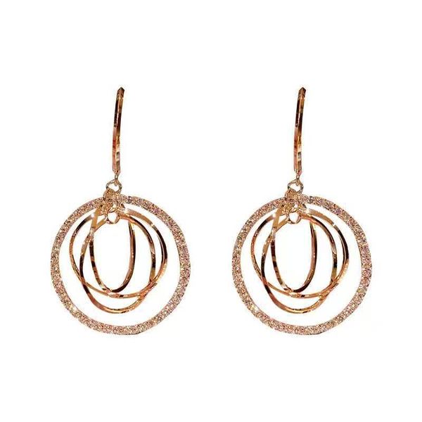 Geometric multi-layered round earrings