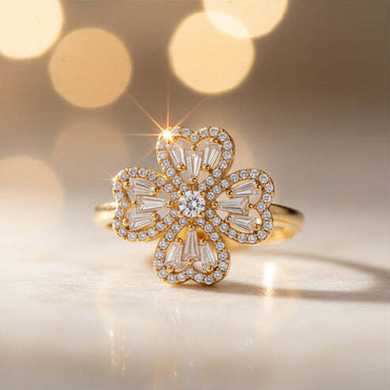 Spinning four-leaf clover ring