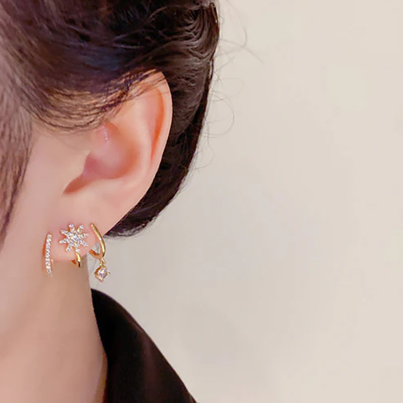 Eight-pointed star linear earrings