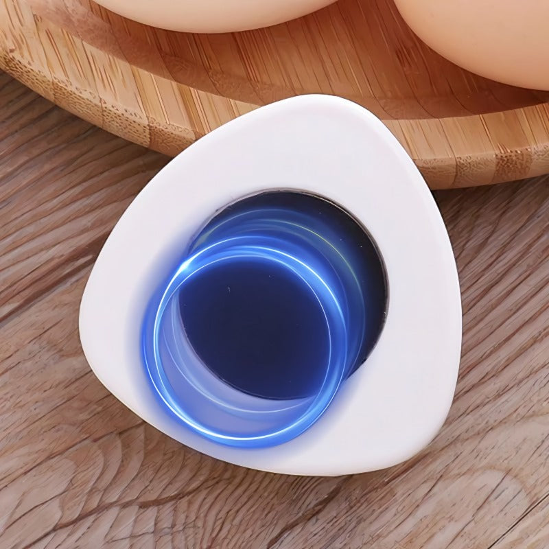 Egg perforator with safety lock