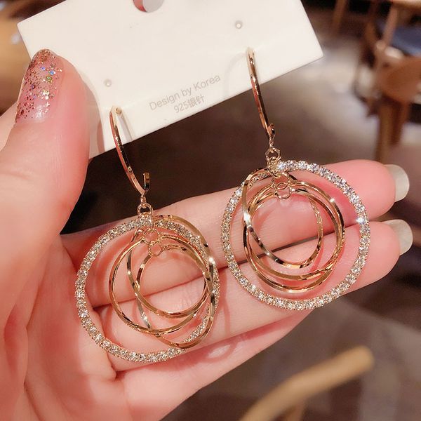 Geometric multi-layered round earrings