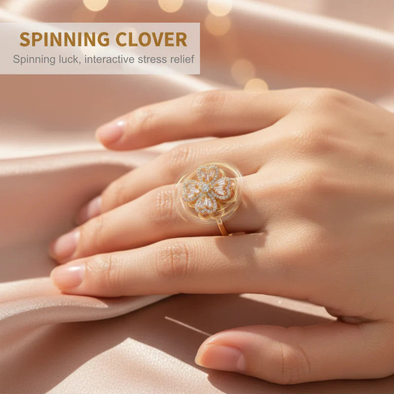 Spinning four-leaf clover ring