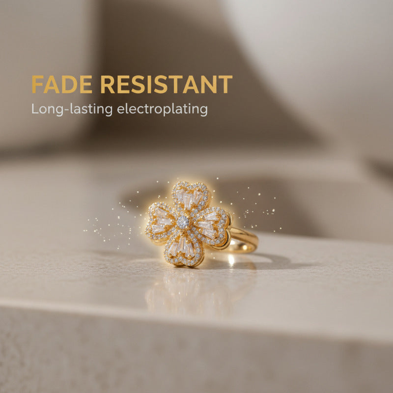 Spinning four-leaf clover ring
