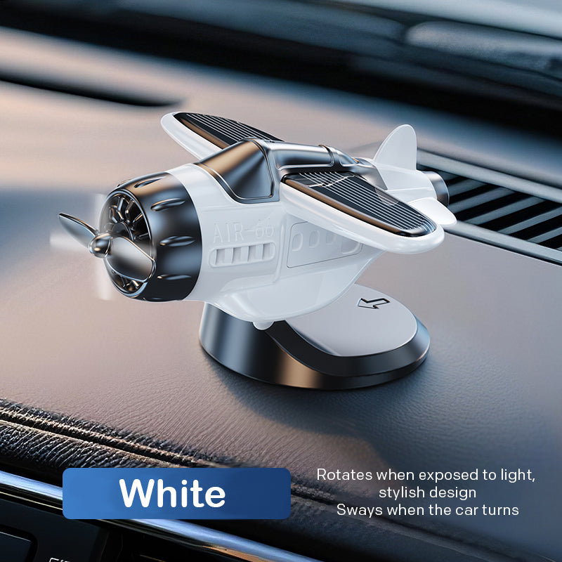 Solar powered airplane shaped car ornaments