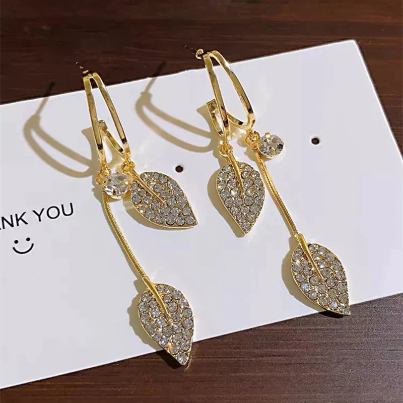 Diamond leaf tassel earrings