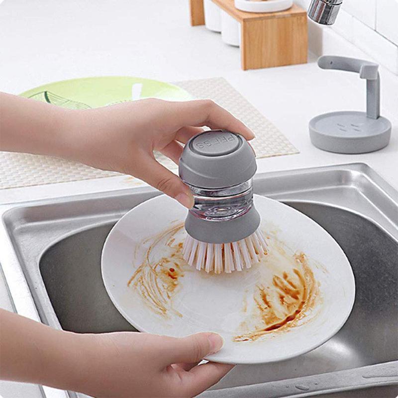 Washing brush with integrated detergent dispenser