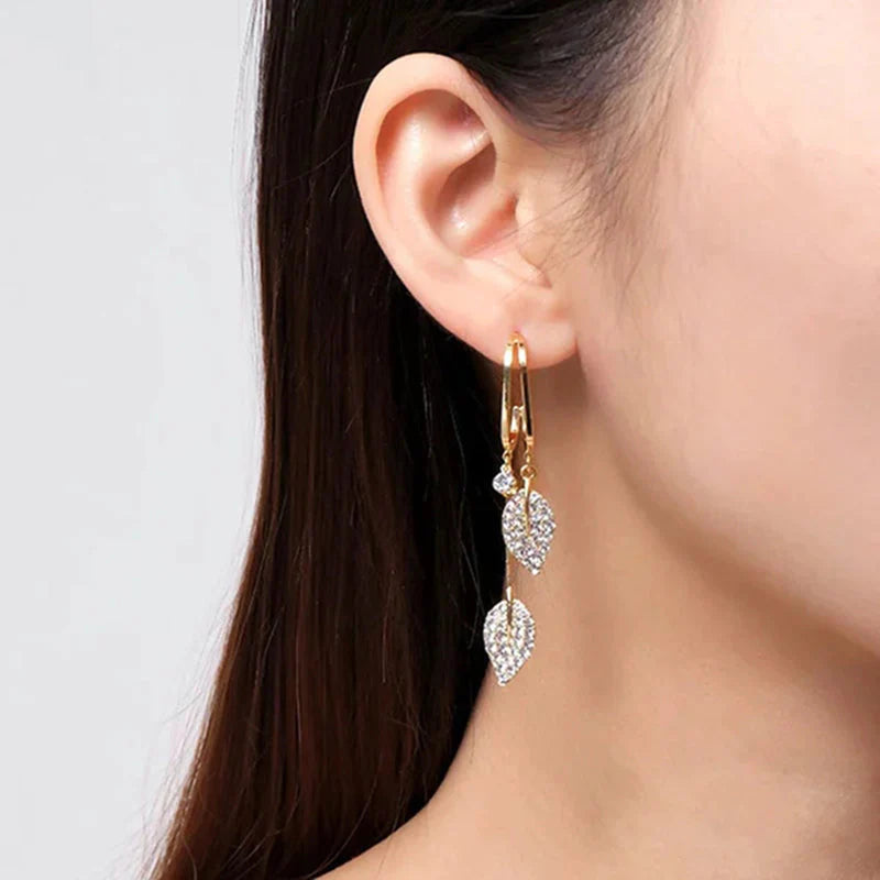 Diamond leaf tassel earrings