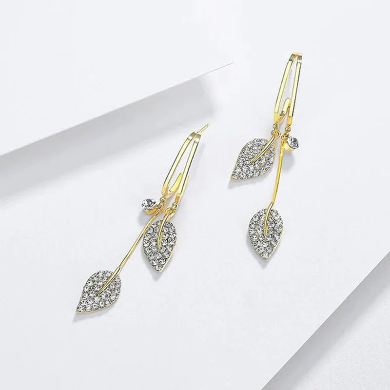 Diamond leaf tassel earrings